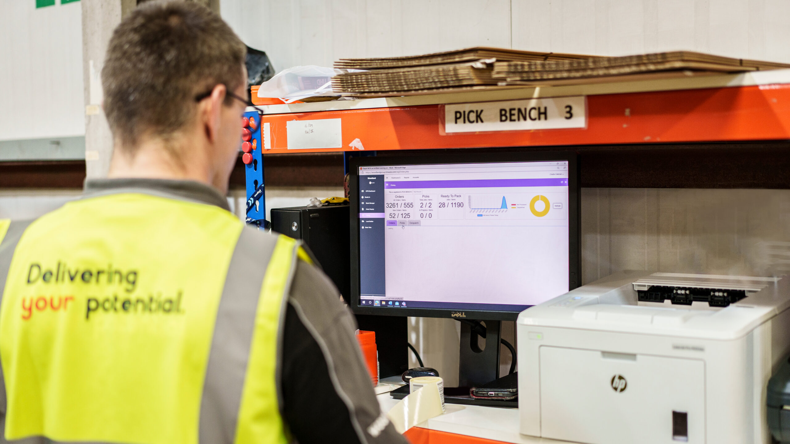 WBS employee using a warehouse management system