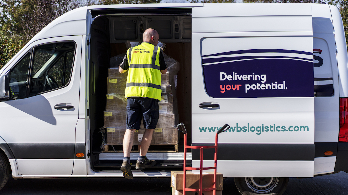 Wbs employee loading van in London